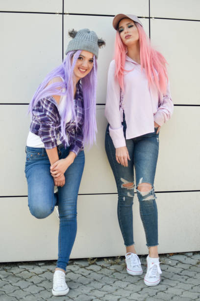 istock two beautiful girl with wig 1066517462