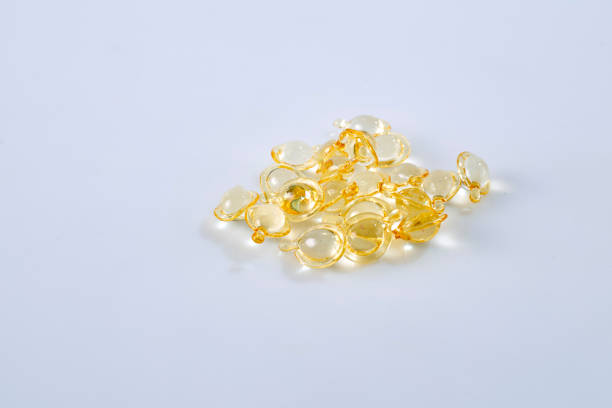 istock Group Hair nourishment. vitamin serum capsule on white 1066521006