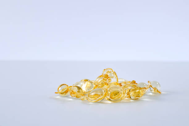 istock Group Hair nourishment. vitamin serum capsule on white 1066521010