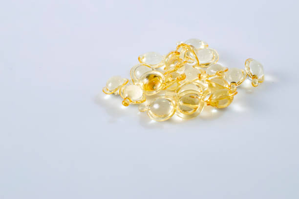 istock Group Hair nourishment. vitamin serum capsule on white 1066521012