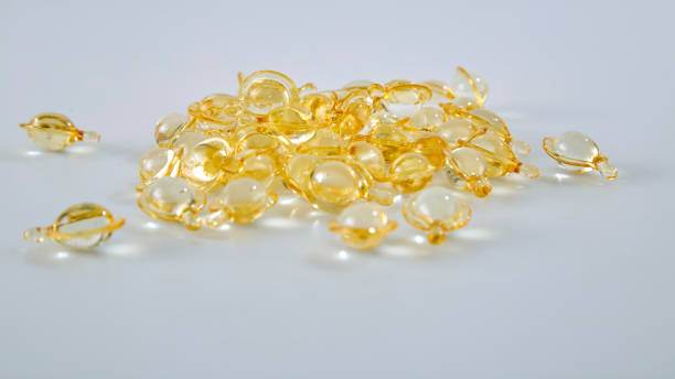 istock Group Hair nourishment. vitamin serum capsule on white 1066521044