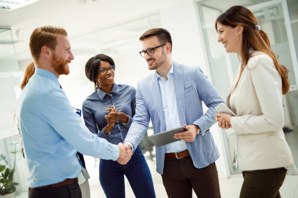istock Business people shaking hands 1066521350
