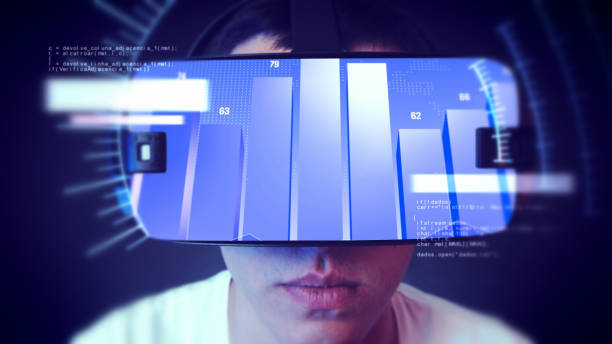 istock Young man wearing VR headset and watching business related graphics. 1066523696