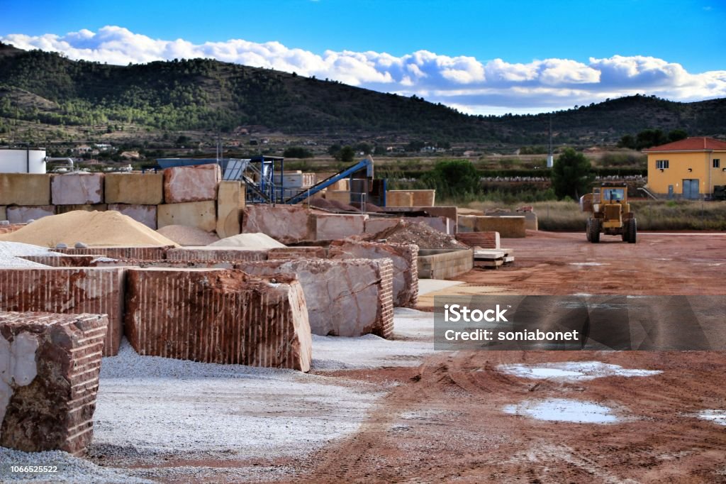 Colorful construction aggregate mountains in Spain Colorful construction aggregate mountains in Alicante, Spain Backgrounds Stock Photo