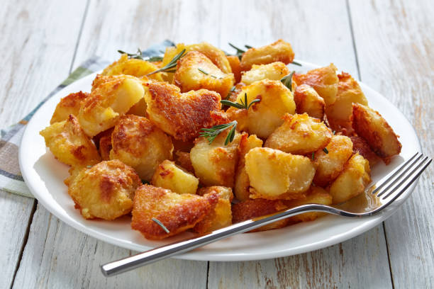 istock Delicious crispy Roast Potatoes, top view 1066529524