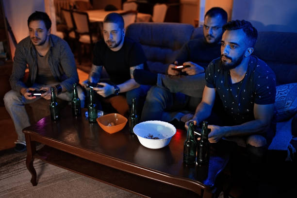 istock Friends playing games and eating snacks 1066529688
