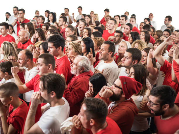 istock Crowd of sport fans cheering. Isolated on white 1066530940