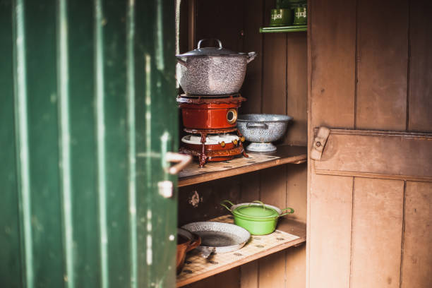 istock Old vintage oil stoves fired on using paraffin in an authentic kitchen with atributes. 1066534184