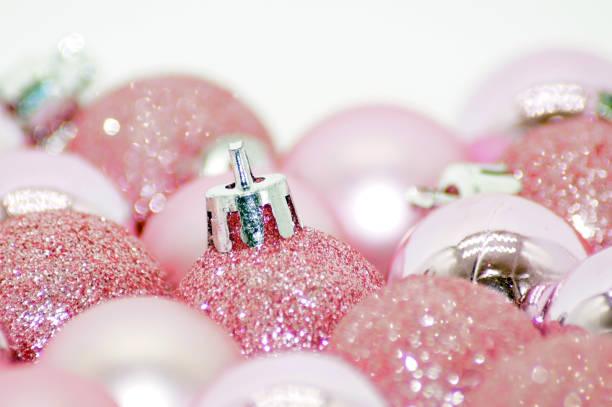 istock Festive background of pink Christmas tree balls 1066538636