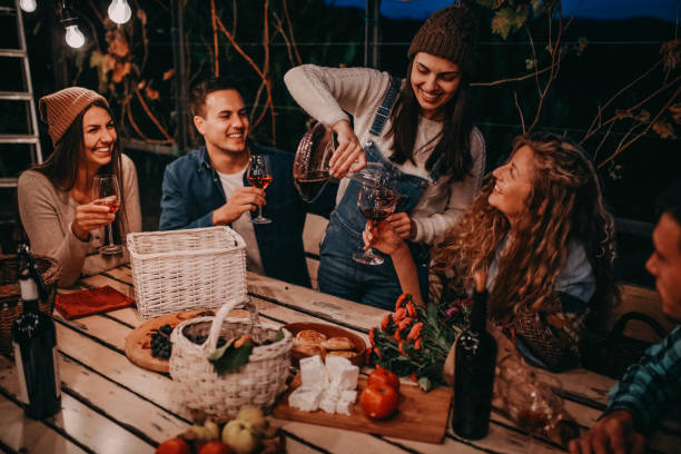 istock Young people enjoying wine 1066540350
