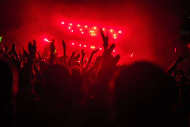 istock Hands up at a festival 1066544114
