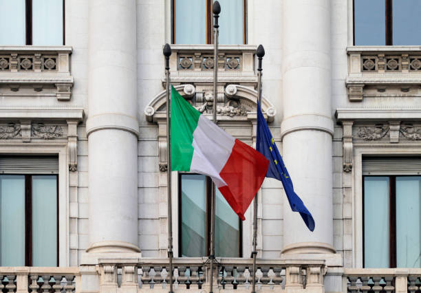 istock Italian flag and deflated EU flag 1066546596
