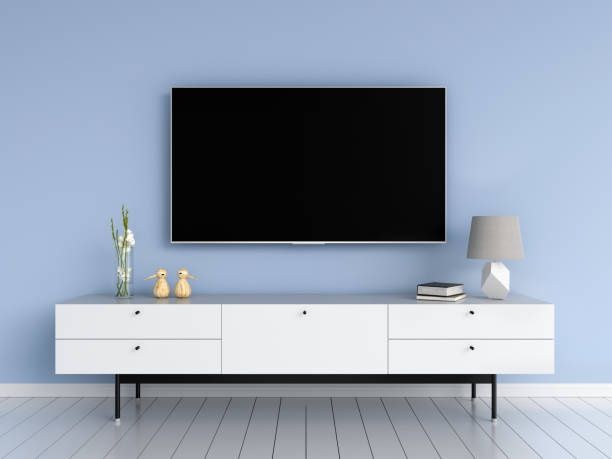 istock Widescreen TV in living room, 3D rendering 1066547060