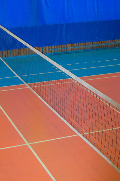 istock An empty gym with a volleyball net, chairs and display Board in the school 1066549706