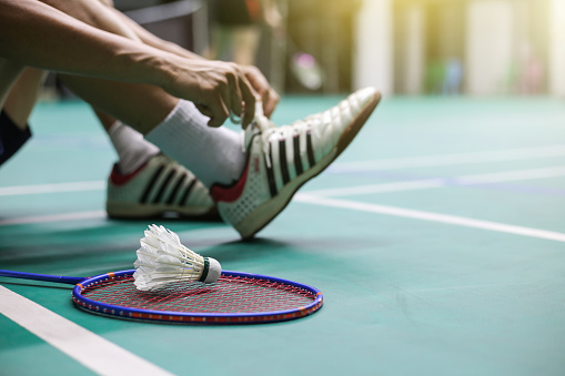 badminton - indoor badminton courts with players
