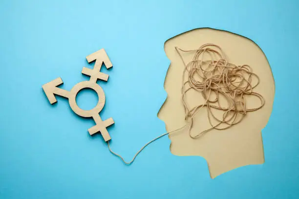Symbol transgender. Head with thoughts of changing sex or love for the opposite sex