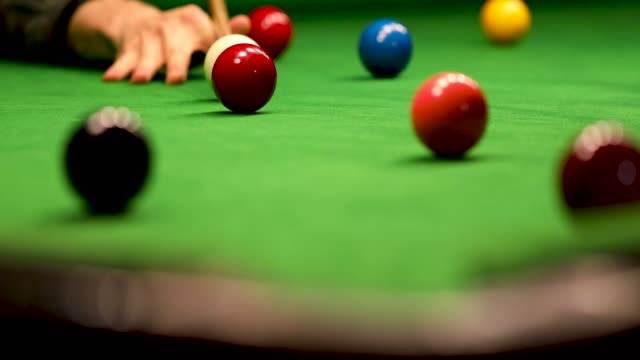 snooker - aim and hit the red ball into a pocket