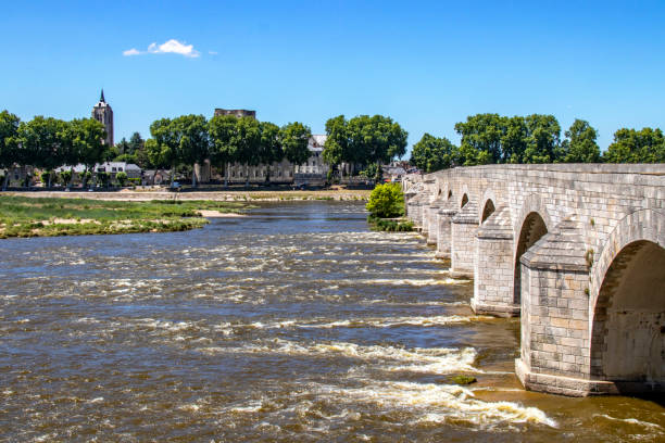 Beaugency. The bridge. Loiret. Centre-Val de Loire Shooting, of the bridge built in the fourteenth century, with a length of 460 meters composed of 24 arches, zoom 18/135, 200 iso, f 16, 1/160 second orleans france photos stock pictures, royalty-free photos & images