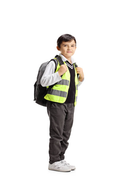 istock Schoolboy with backpack and safety vest 1066572464
