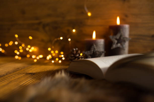 istock Cozy evening with christmas lights and book 1066572730