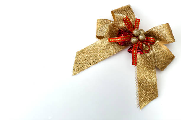 istock gold and red ribbin bow for gift isolated white background 1066576016