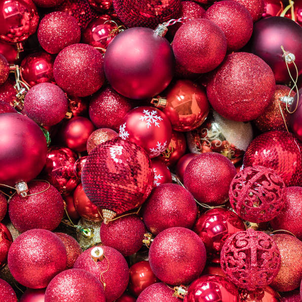 istock Christmas balls red and gold background, toned 1066590820
