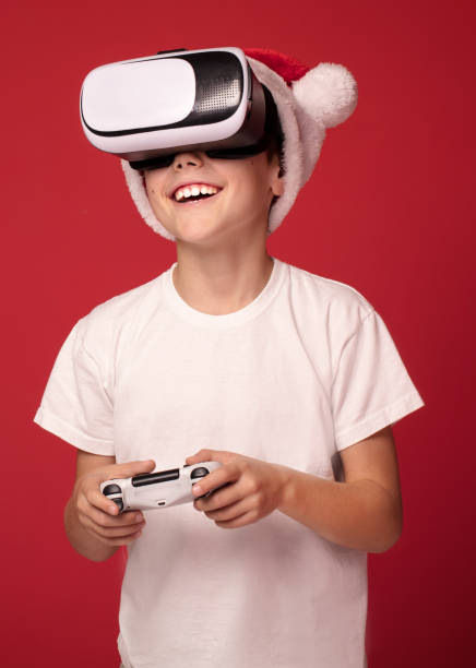 istock Happy boy posing in Santa Claus hat. 1066604038
