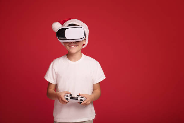 istock Happy boy posing in Santa Claus hat. 1066604192