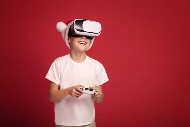 istock Happy boy posing in Santa Claus hat. 1066604238