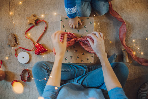 istock Woman wrapping gifts 1066606716