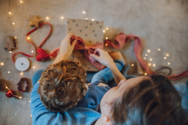 istock Woman wrapping gifts 1066606848
