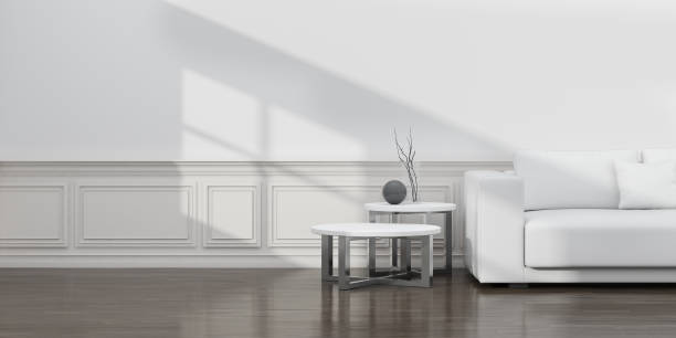 istock View of empty room space with sofa and side table on laminate floor.Perspective of minimal design architecture.Sunlight cast shadow on the wall. 3d rendering. 1066608382
