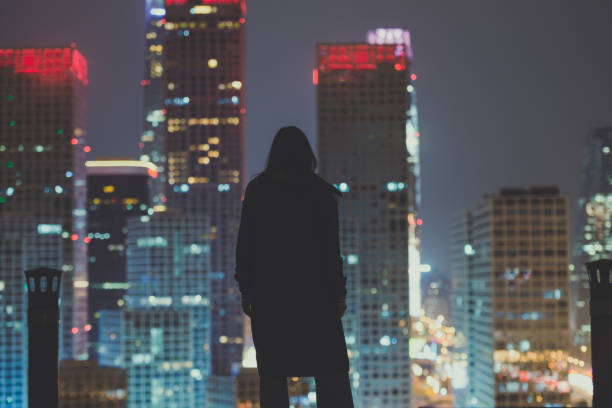istock Female Wearing Suit Looking at City 1066608536