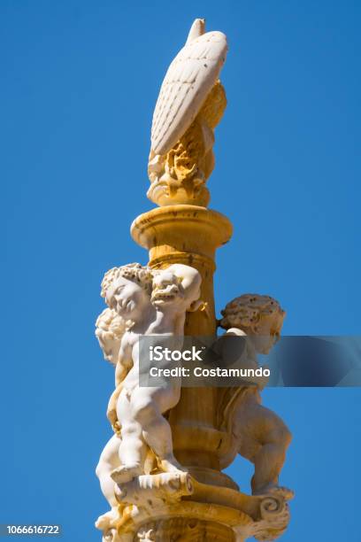 Statue Plaza De La Constitucion Malaga Stock Photo - Download Image Now - Andalusia, Angel, Downtown District