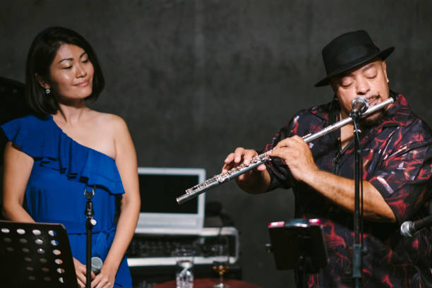 Multi-ethnic jazz music group performing at stage