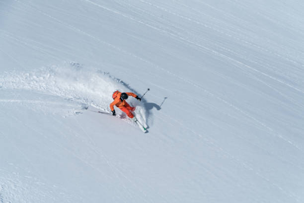 istock Backcountry skier flies down slope 1066621868