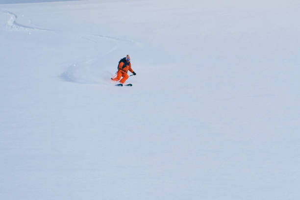 istock Backcountry skier flies down slope 1066621918
