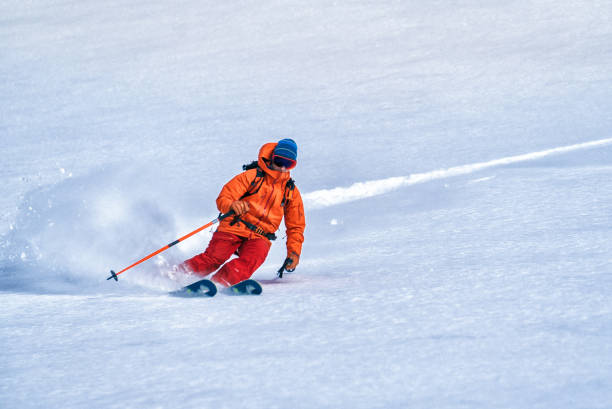 istock Backcountry skier flies down slope 1066621938