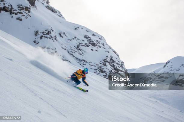 Backcountry Skier Flies Down Slope Stock Photo - Download Image Now - Georgia - US State, Ski, Back Country Skiing