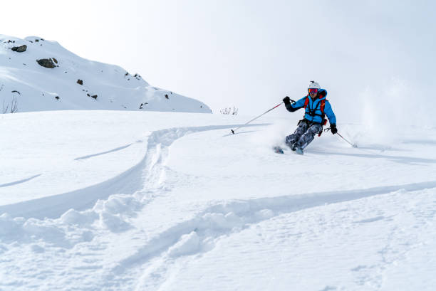 istock Backcountry skier flies down slope 1066622006
