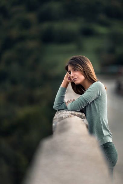 istock Woman on the bridge 1066626618