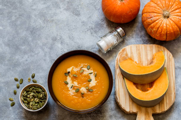 istock pumpkin soup with pumpkin seeds and cream 1066631826