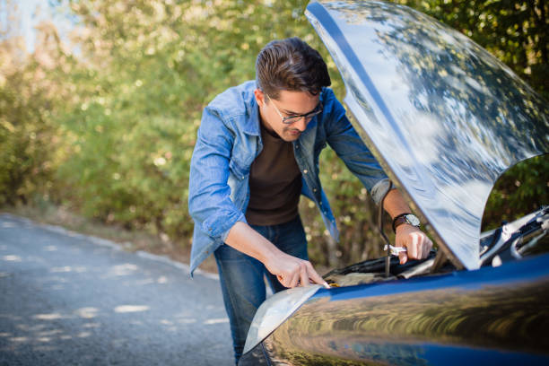 istock Damaged car on the road 1066632698