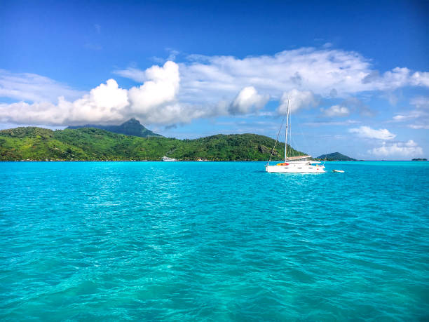 istock Catamaran in a turquoise lagoon 1066640934