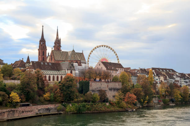 blick auf die stadt basel mit munster und riesenrad - round bale stock-fotos und bilder