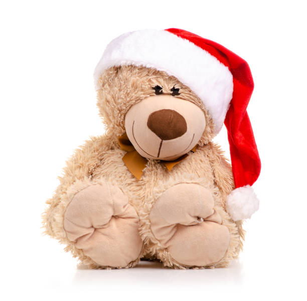 istock Christmas toy bear with santa hat 1066648212