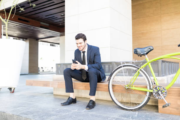 istock Businessman Checking E-Mail On Mobile Phone In City 1066657932