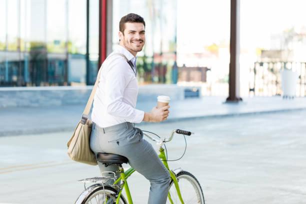 istock Executive With Fresh Drink Having Fun During Bike Ride 1066659936
