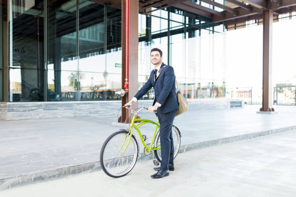 istock Good Looking Male Executive Going To Office With Bicycle 1066660298