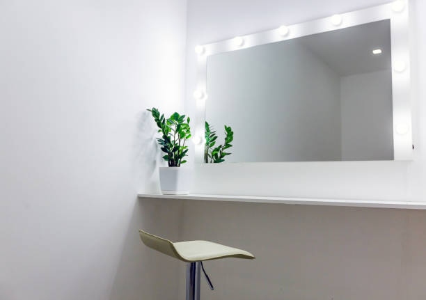 Woman's makeup place with mirror and bulbs